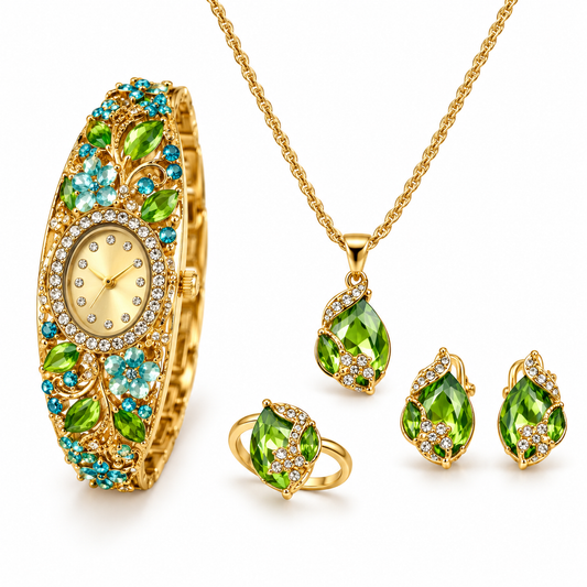 Gold tone green gemstone watch and jewellery set on white background