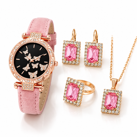 Pink butterfly watch and jewellery set on white background