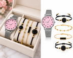 Pink dial watch and black gold bracelet set in premium box and white studio layout